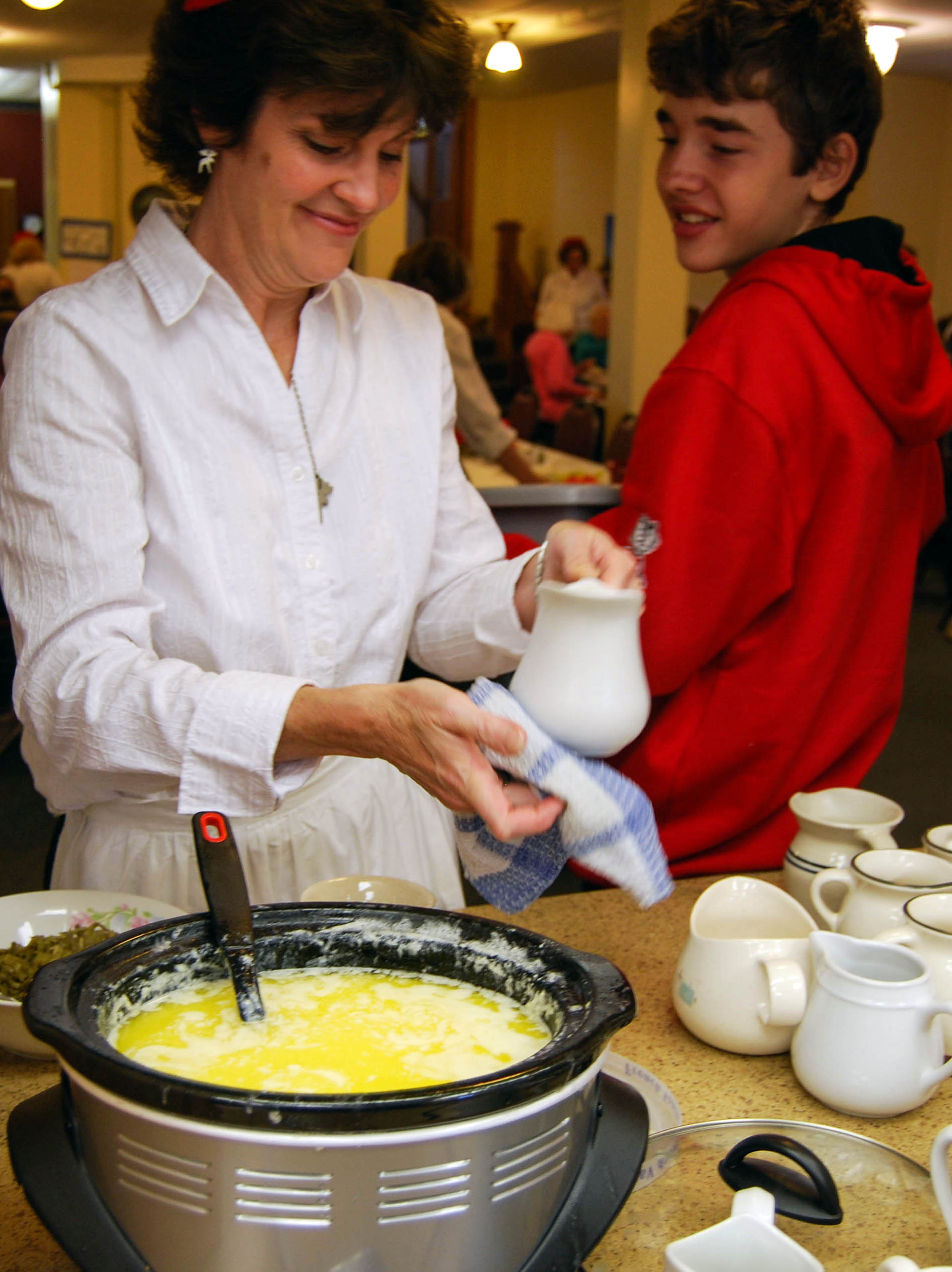 Butter is warmed in a slow cooker and transferred to creamers.
Photo by: Molly Reppen